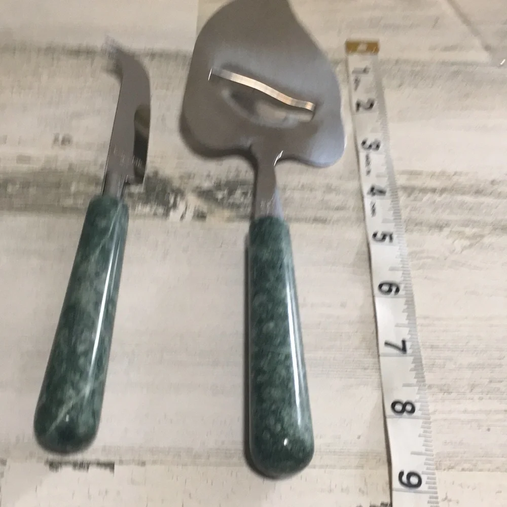 Pier 1 stainless steel cheese knife set with green marble handle.